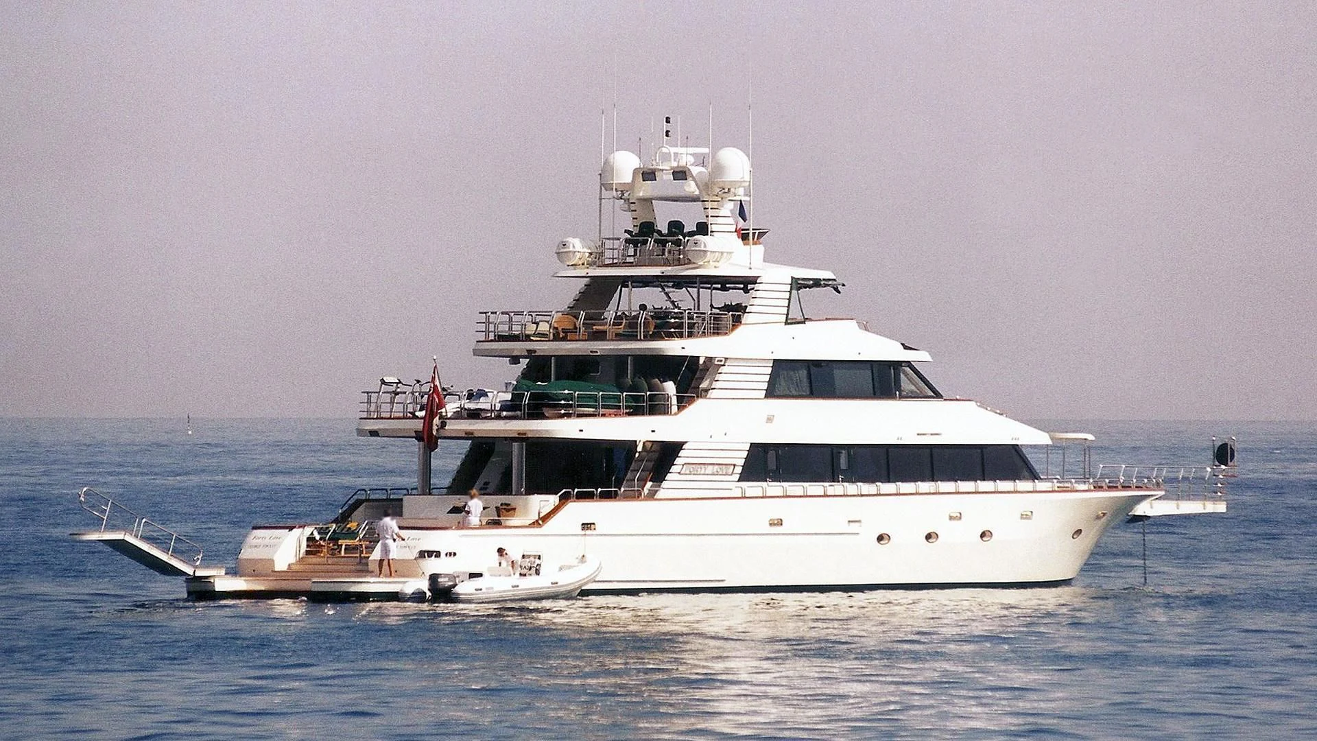 a white yacht in the water aboard FORTY LOVE Yacht for Charter