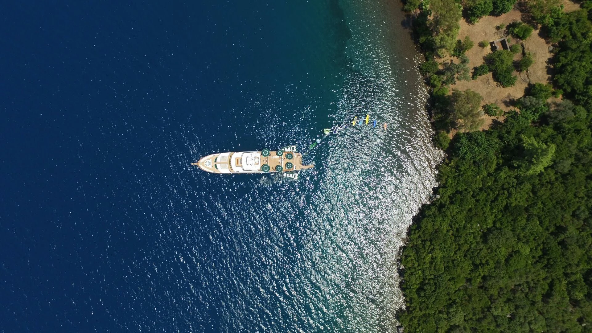 a small boat in the water aboard FORTY LOVE Yacht for Charter