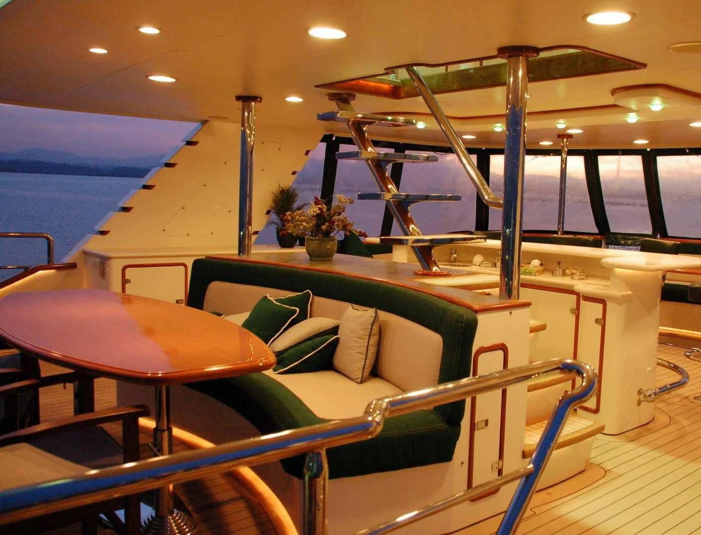 a room with a couch and a table aboard FORTY LOVE Yacht for Charter