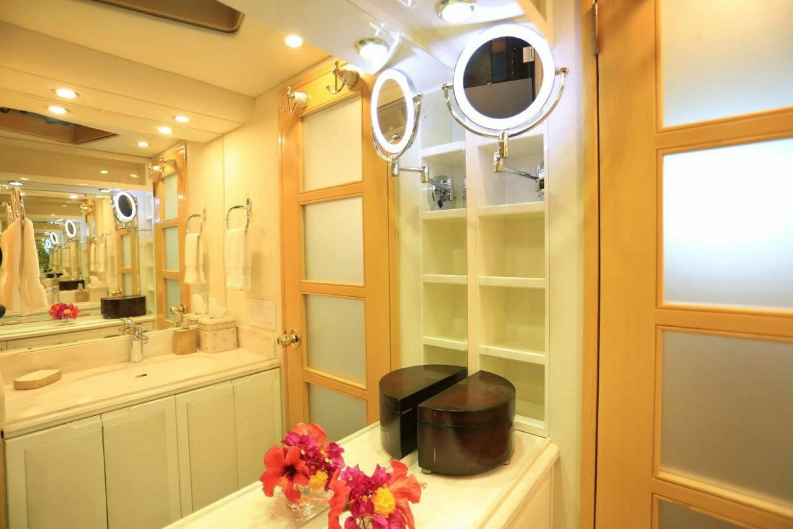 a bathroom with a mirror and a sink aboard FORTY LOVE Yacht for Charter