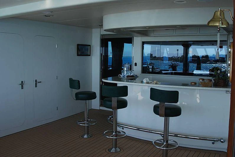 a kitchen with stools and stools aboard FORTY LOVE Yacht for Charter