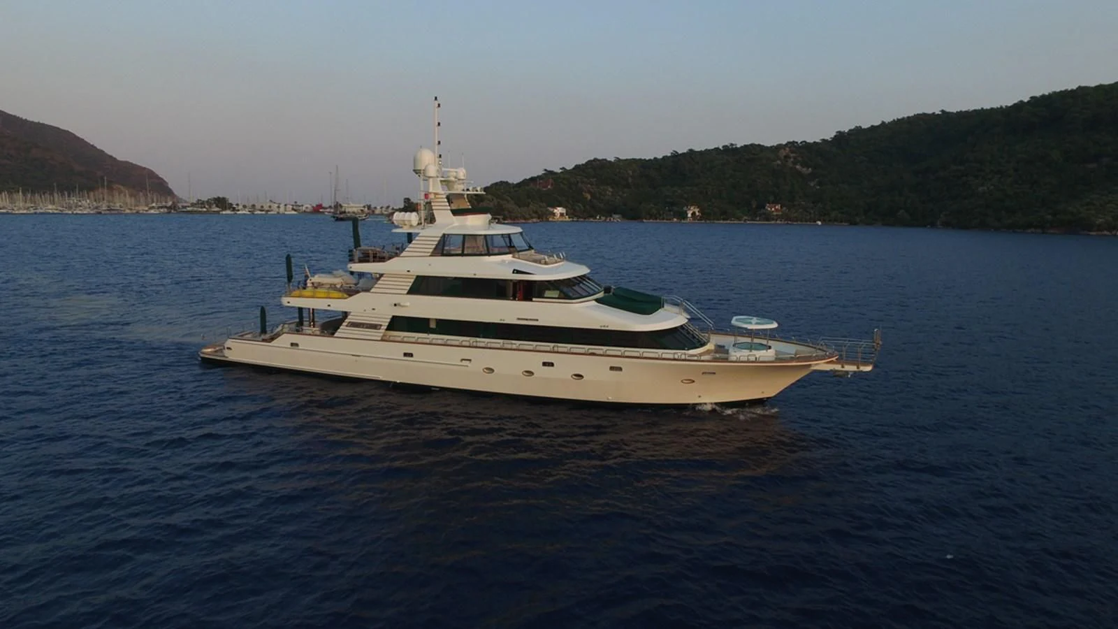 a white yacht on the water aboard FORTY LOVE Yacht for Charter