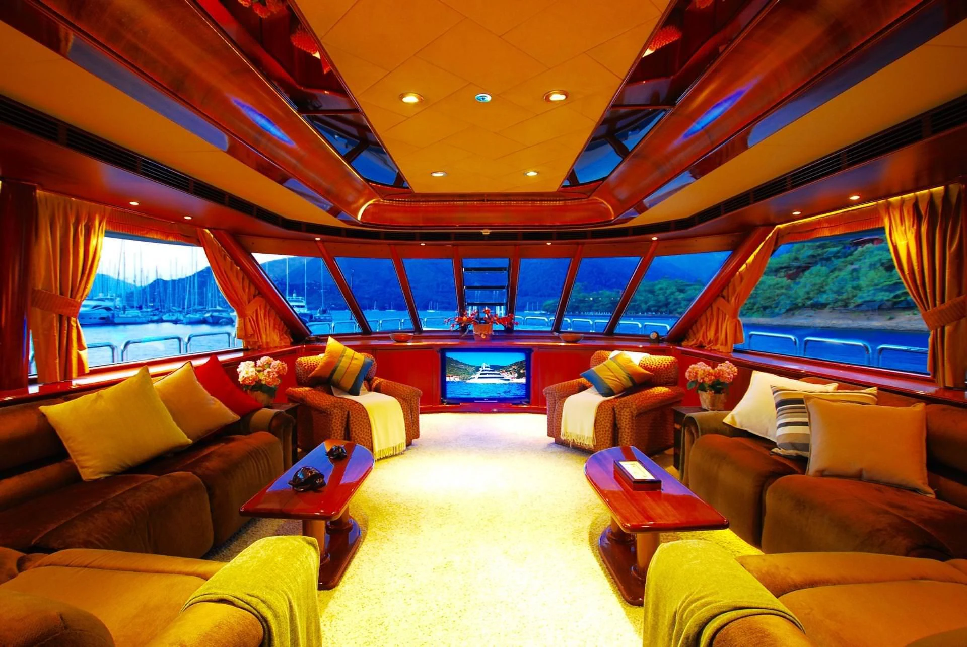 a living room with a large window aboard FORTY LOVE Yacht for Charter