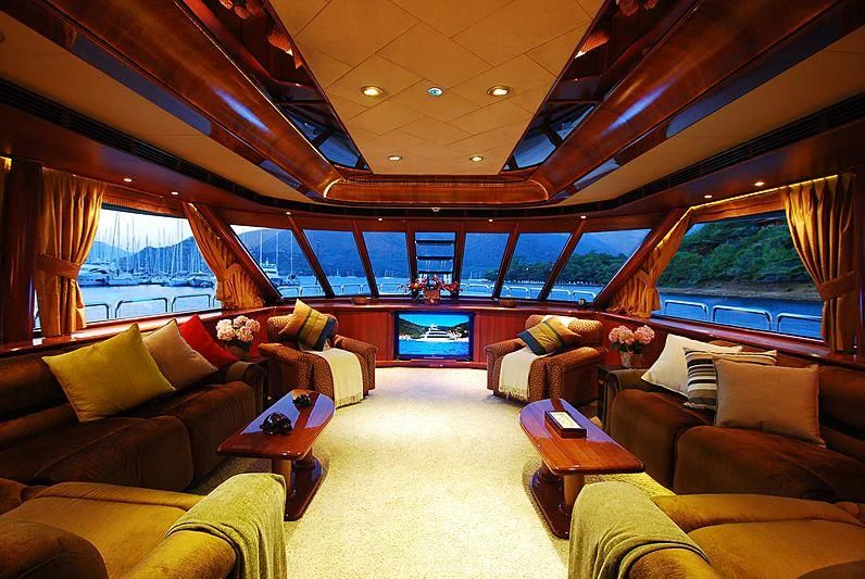 a living room with a large window aboard FORTY LOVE Yacht for Charter