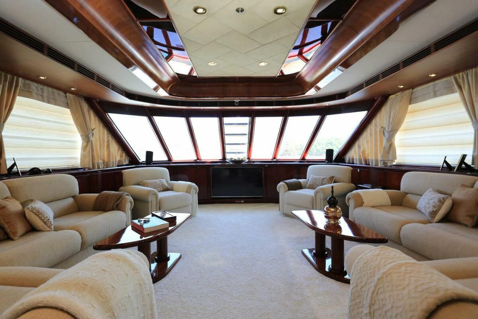 a living room with a large window aboard FORTY LOVE Yacht for Charter