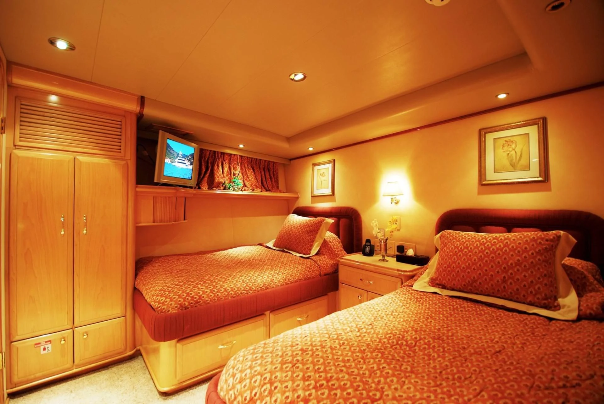 a bedroom with two beds aboard FORTY LOVE Yacht for Charter
