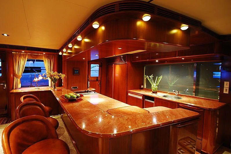a large kitchen with a bar aboard FORTY LOVE Yacht for Charter