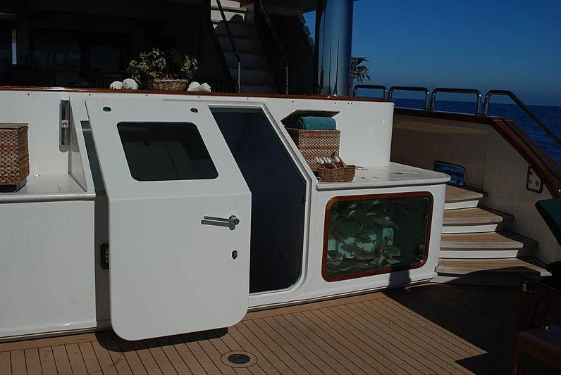 a white kitchen with a white cabinet aboard FORTY LOVE Yacht for Charter