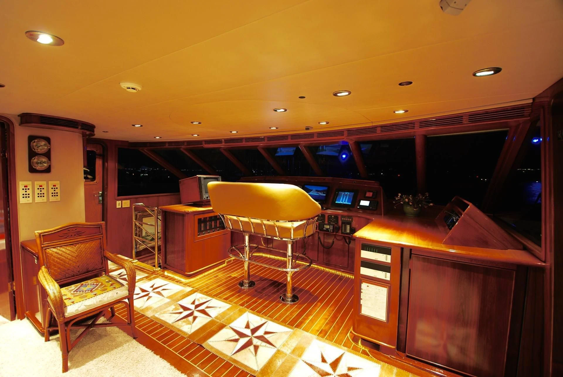 a room with a desk and chairs aboard FORTY LOVE Yacht for Charter