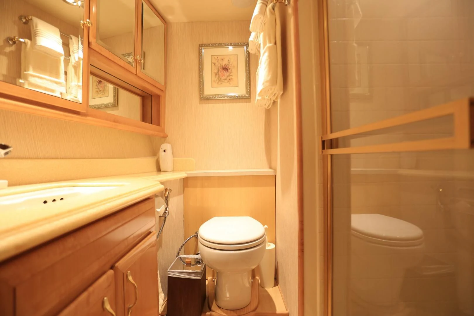 a bathroom with a toilet and sink aboard FORTY LOVE Yacht for Charter