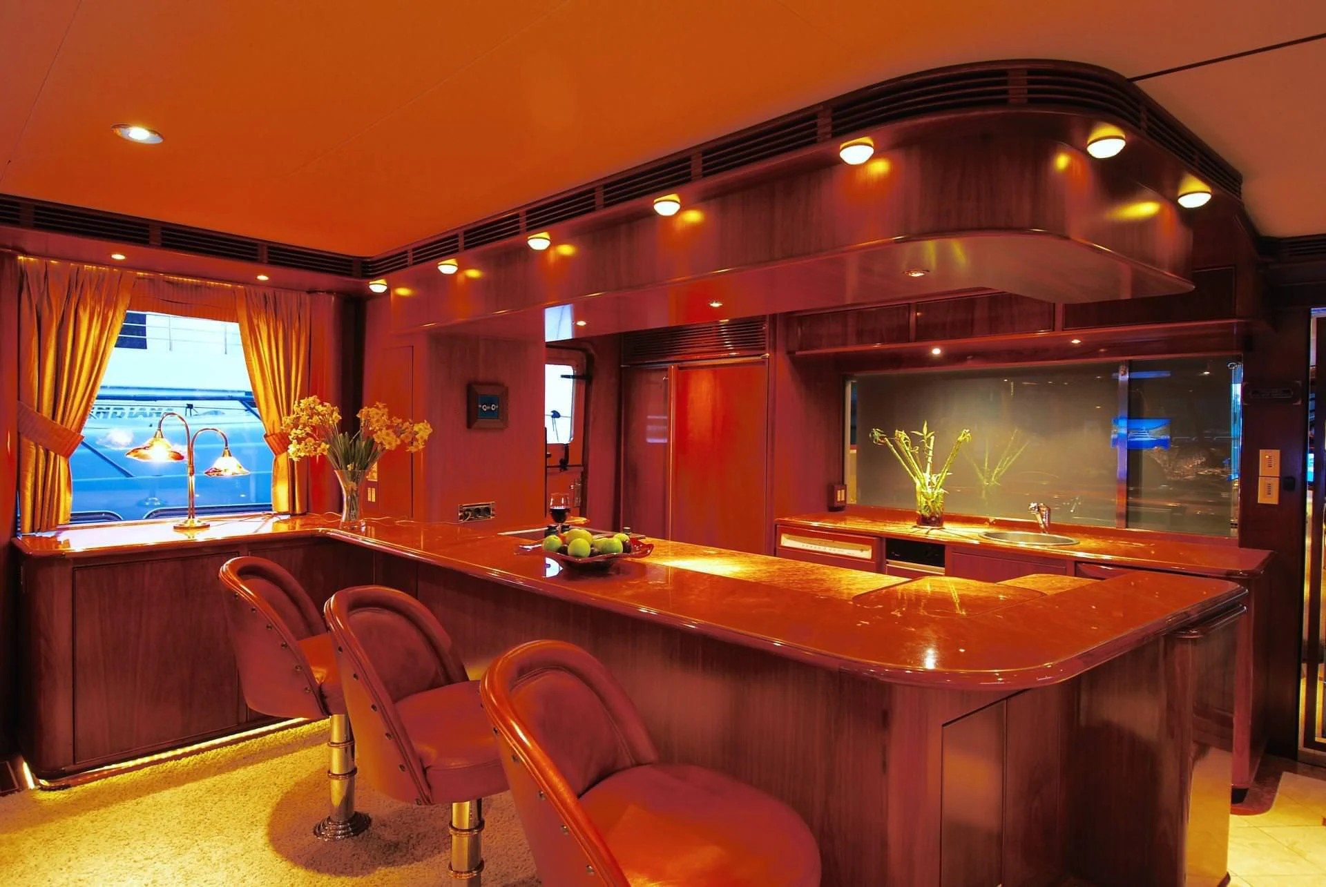 a large kitchen with a bar aboard FORTY LOVE Yacht for Charter