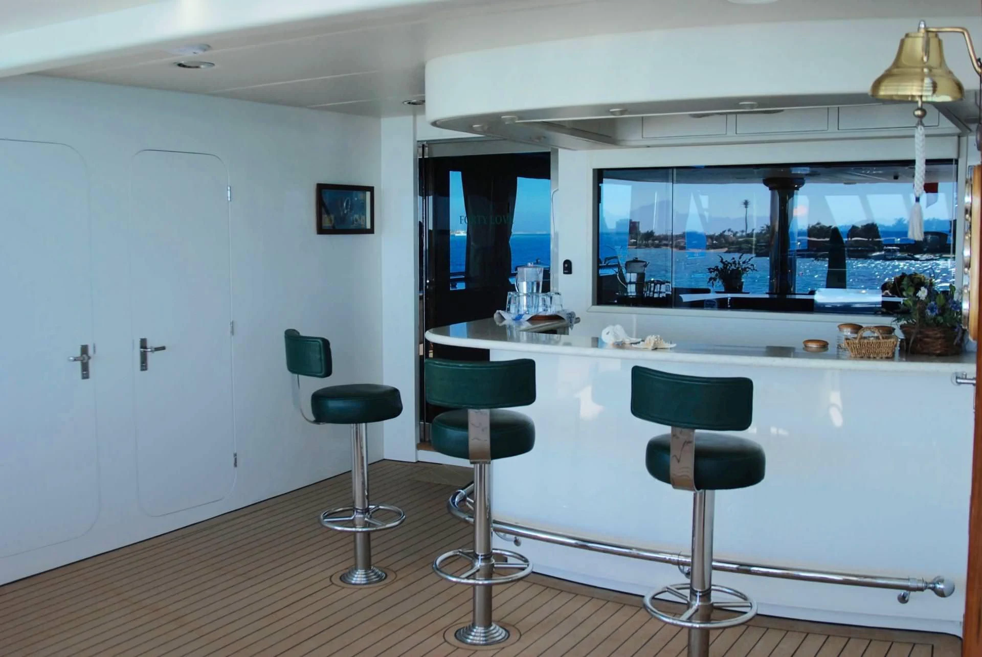 a kitchen with stools and stools aboard FORTY LOVE Yacht for Charter