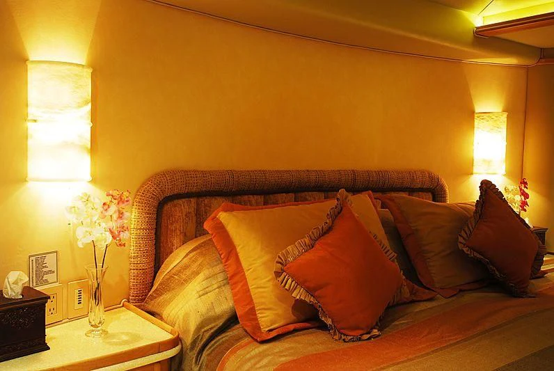 a bed with pillows and pillows aboard FORTY LOVE Yacht for Charter