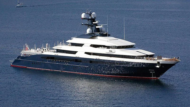 a large ship in the water aboard DRAAK Yacht for Sale