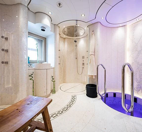 a room with a large wall aboard DRAAK Yacht for Sale