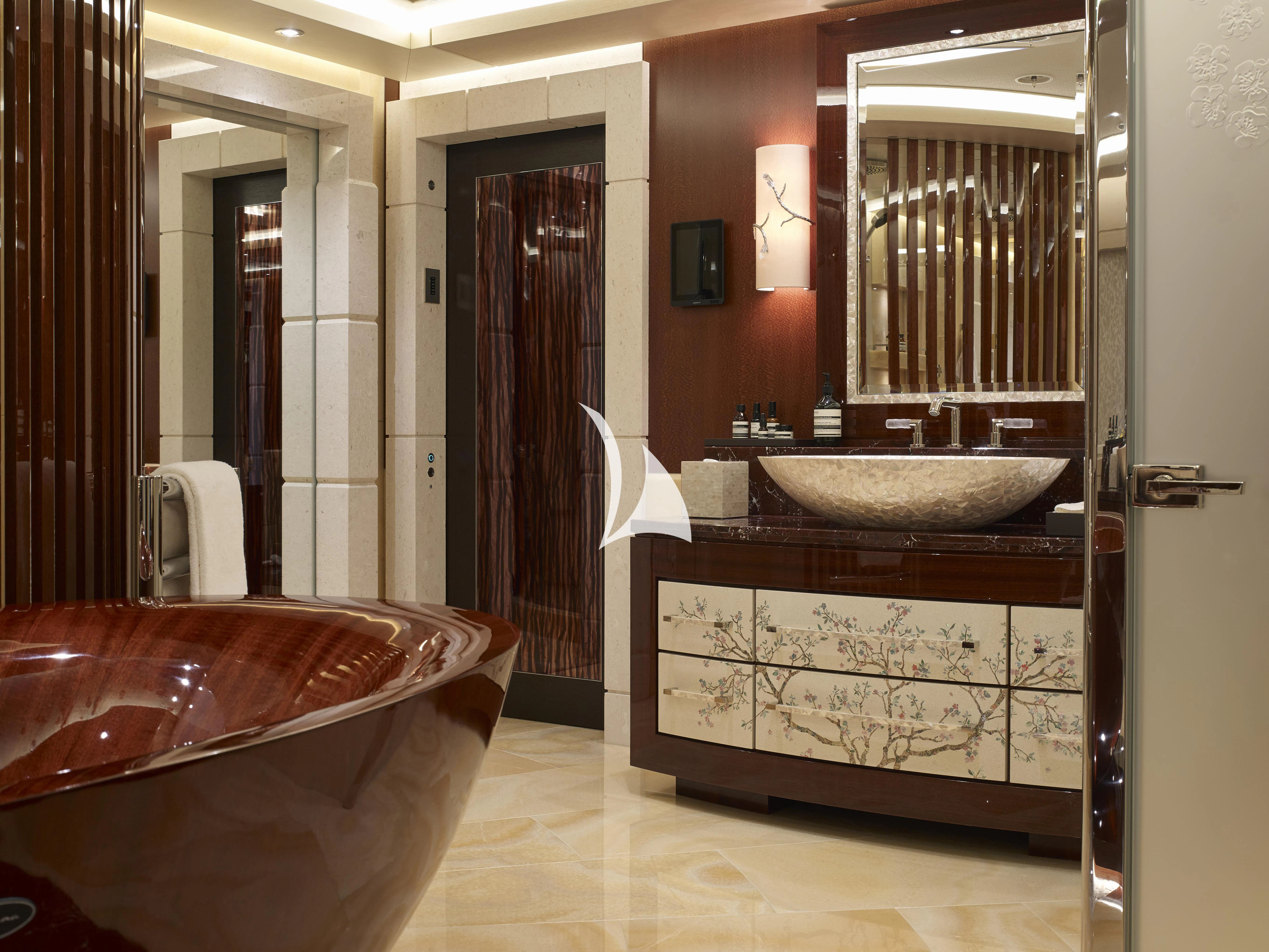 a bathroom with a sink and a bathtub aboard DRAAK Yacht for Sale