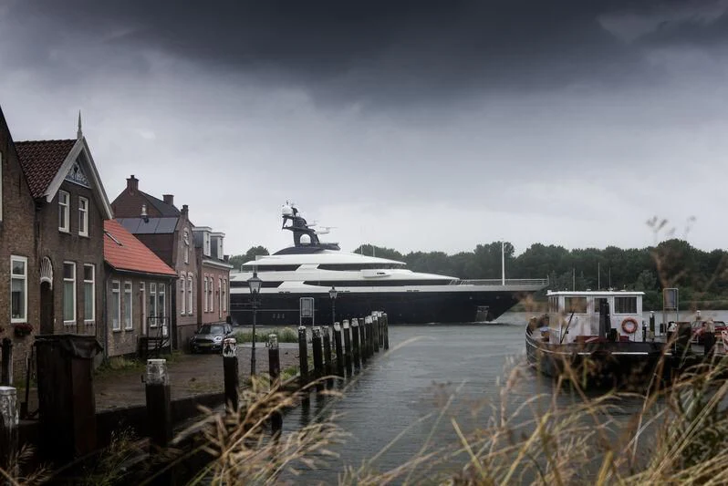 a boat on a river aboard DRAAK Yacht for Sale
