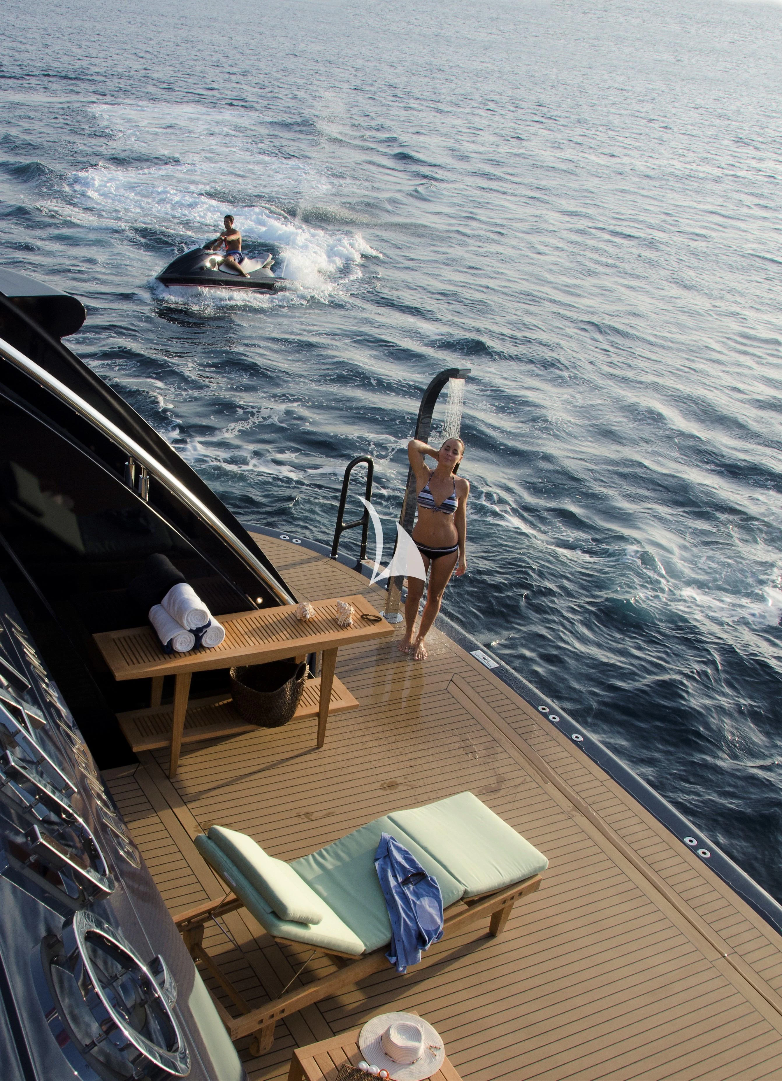 a person standing on a dock aboard DRAAK Yacht for Sale