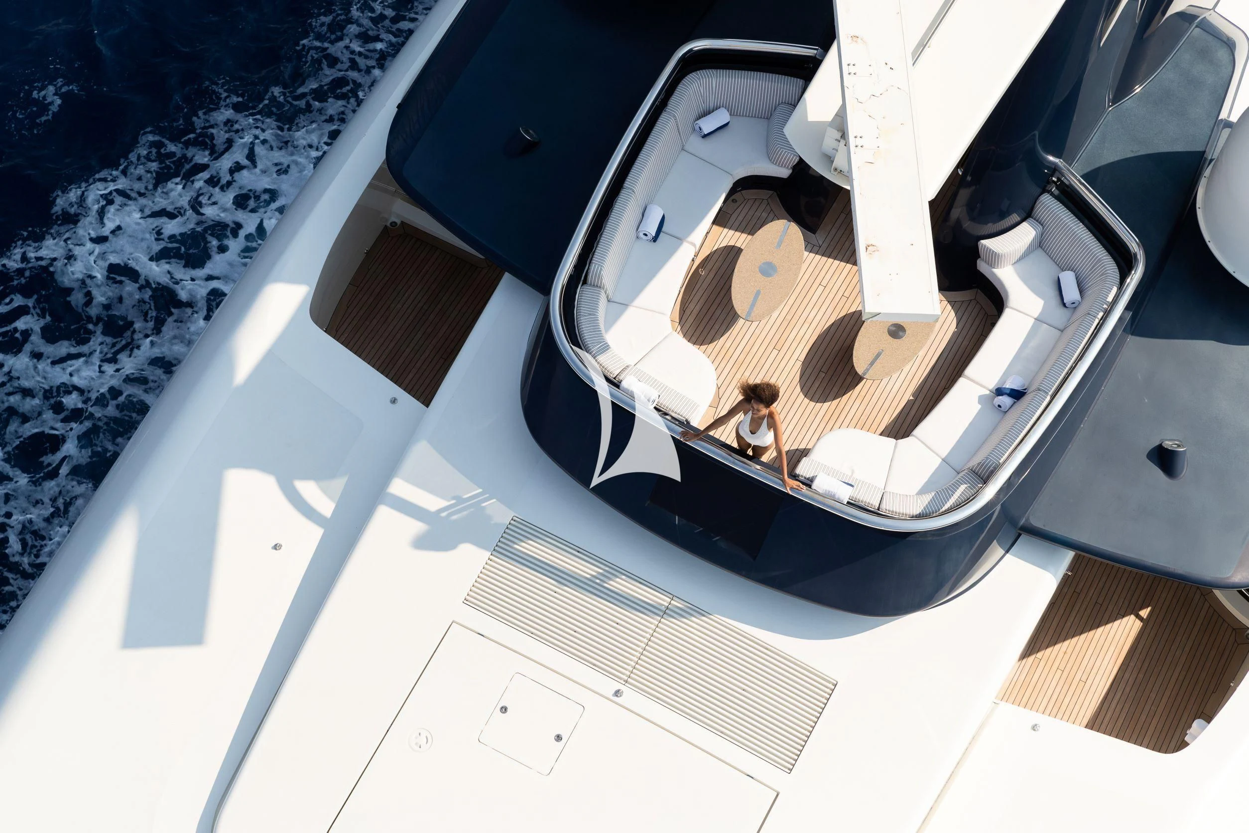 a white and black car aboard DRAAK Yacht for Sale