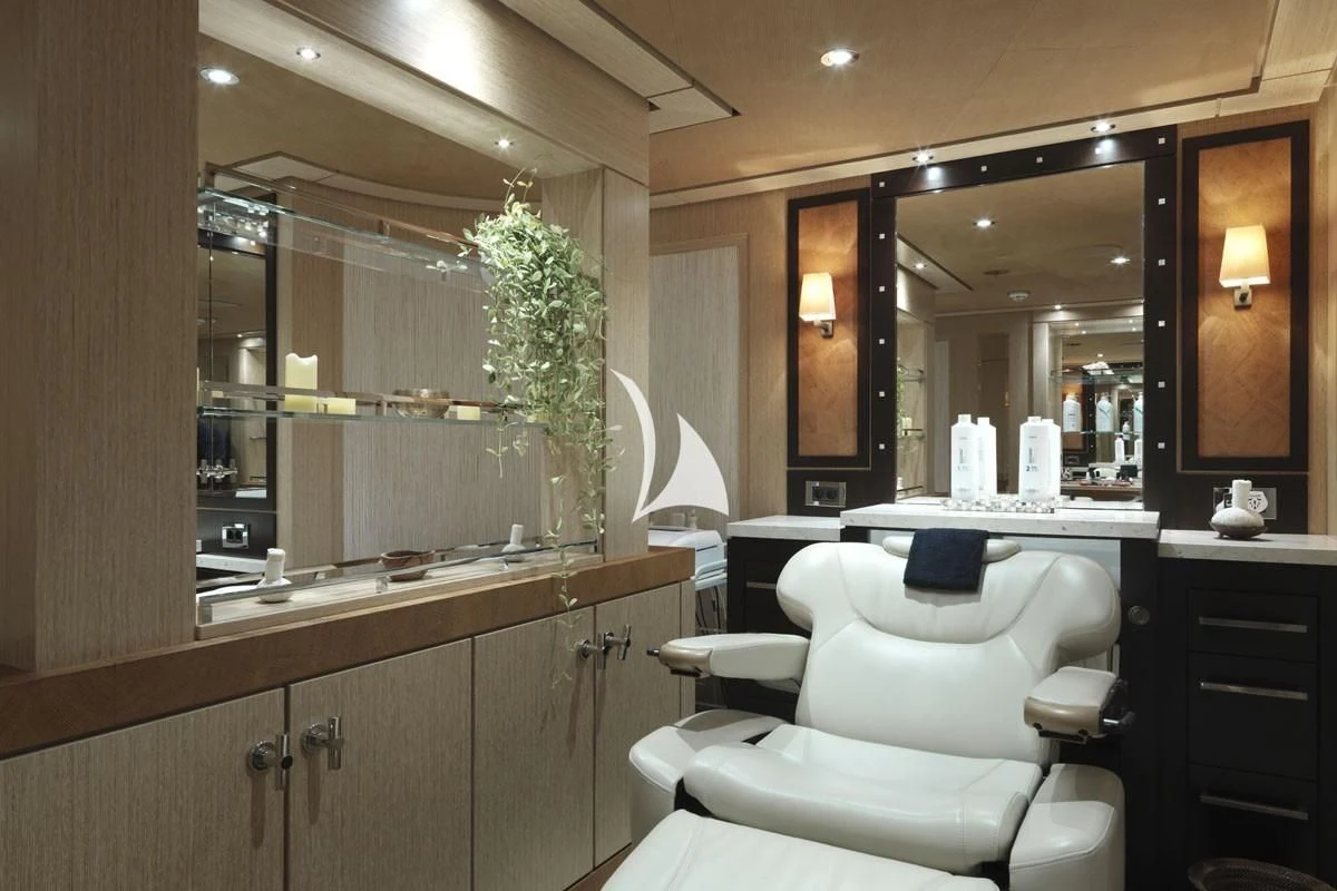 a bathroom with a large mirror aboard DRAAK Yacht for Sale