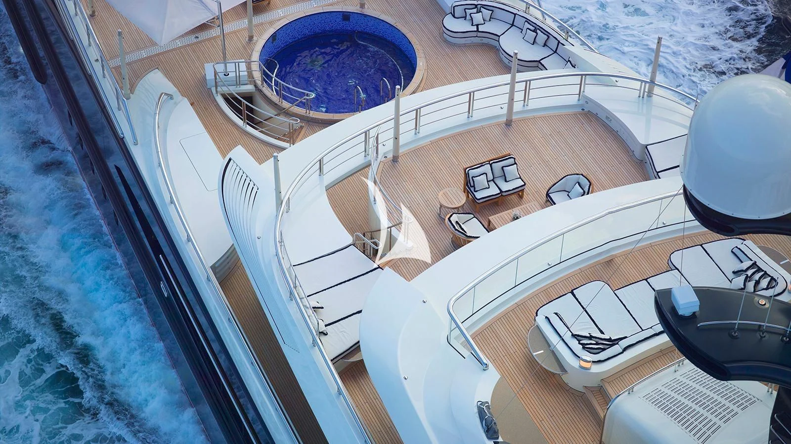 a boat with a deck and a deck and a pool aboard DRAAK Yacht for Sale