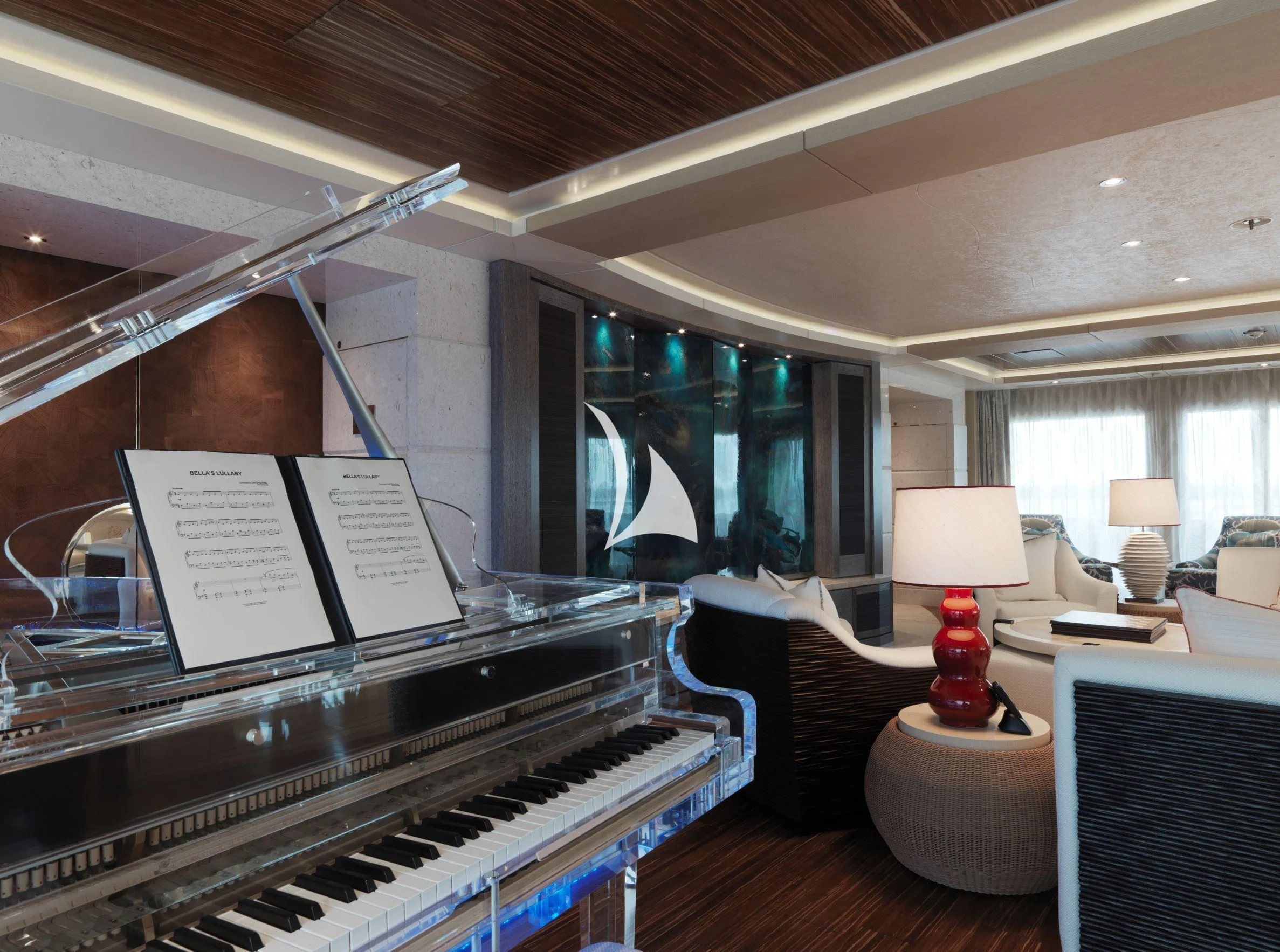 a piano in a room aboard DRAAK Yacht for Sale