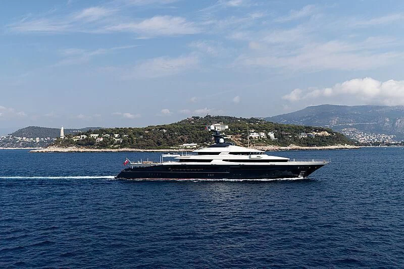 a large ship in the water aboard DRAAK Yacht for Sale