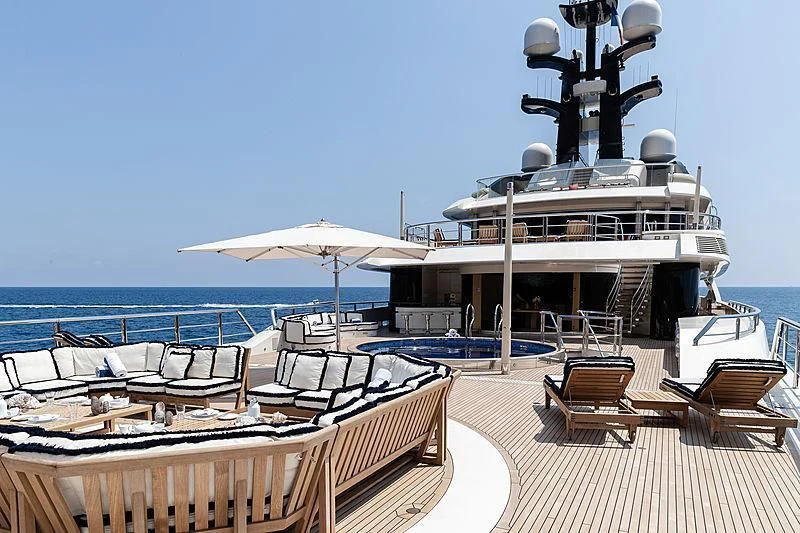 a boat docked at a pier aboard DRAAK Yacht for Sale