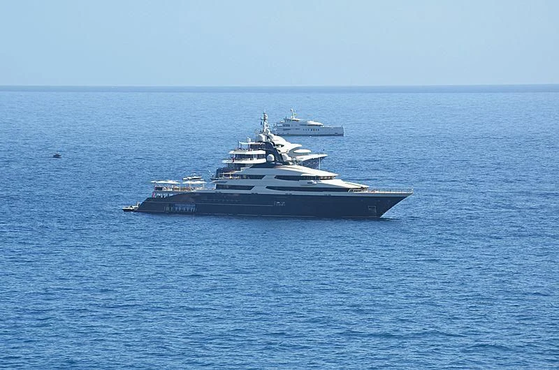 a large ship in the water aboard DRAAK Yacht for Sale