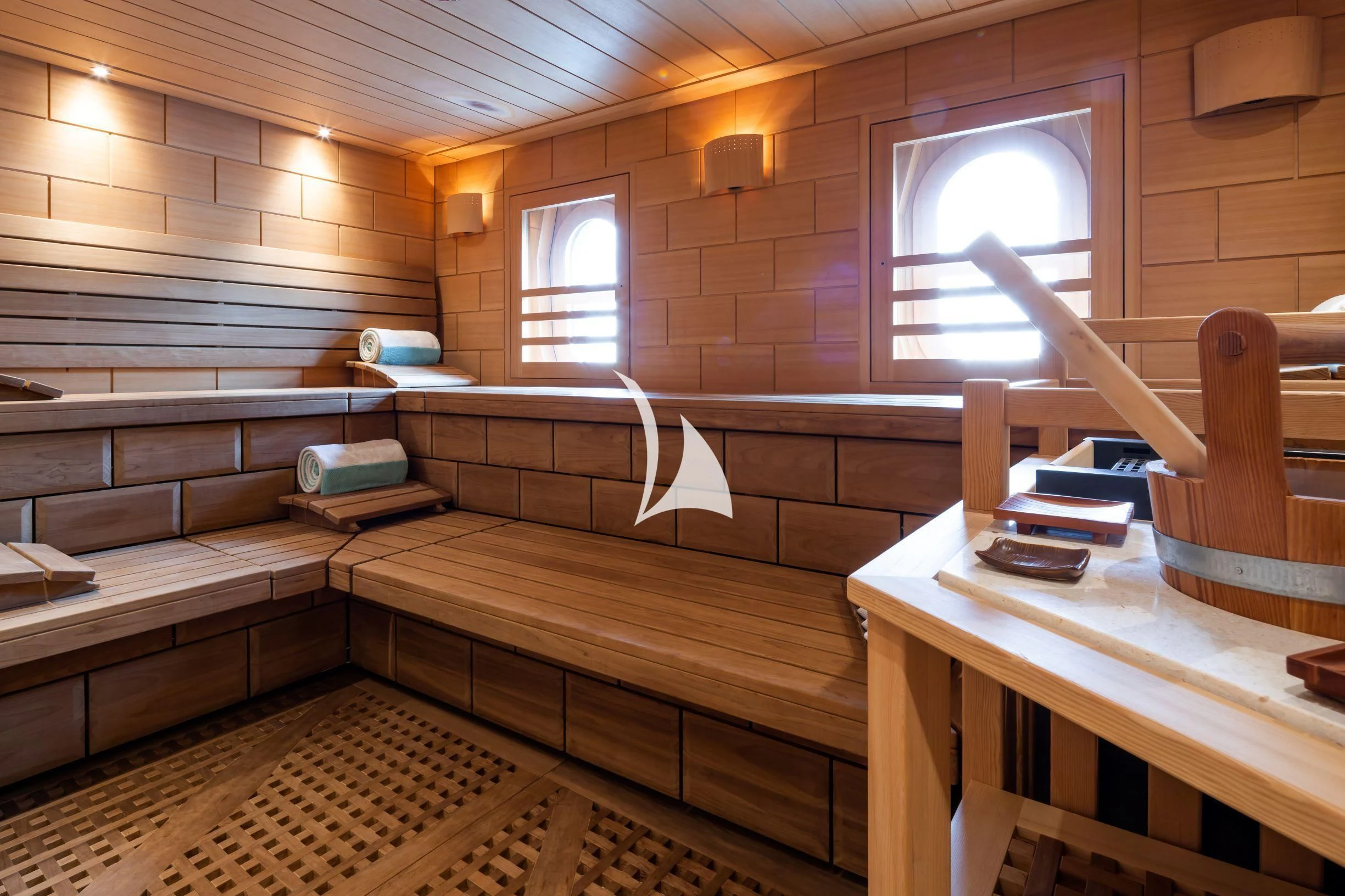 a room with wooden walls and a window aboard DRAAK Yacht for Sale