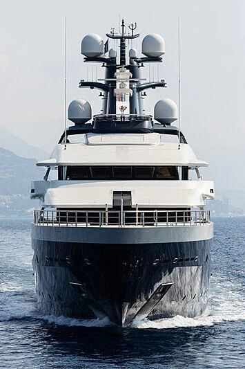 a large ship in the water aboard DRAAK Yacht for Sale