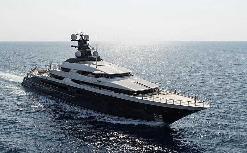 a large ship in the water aboard DRAAK Yacht for Sale