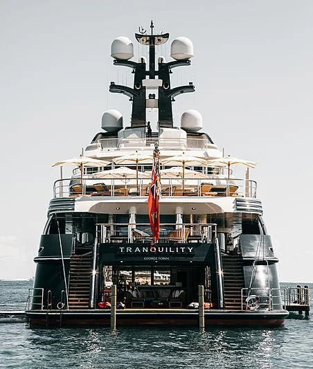 a large ship in the water aboard DRAAK Yacht for Sale