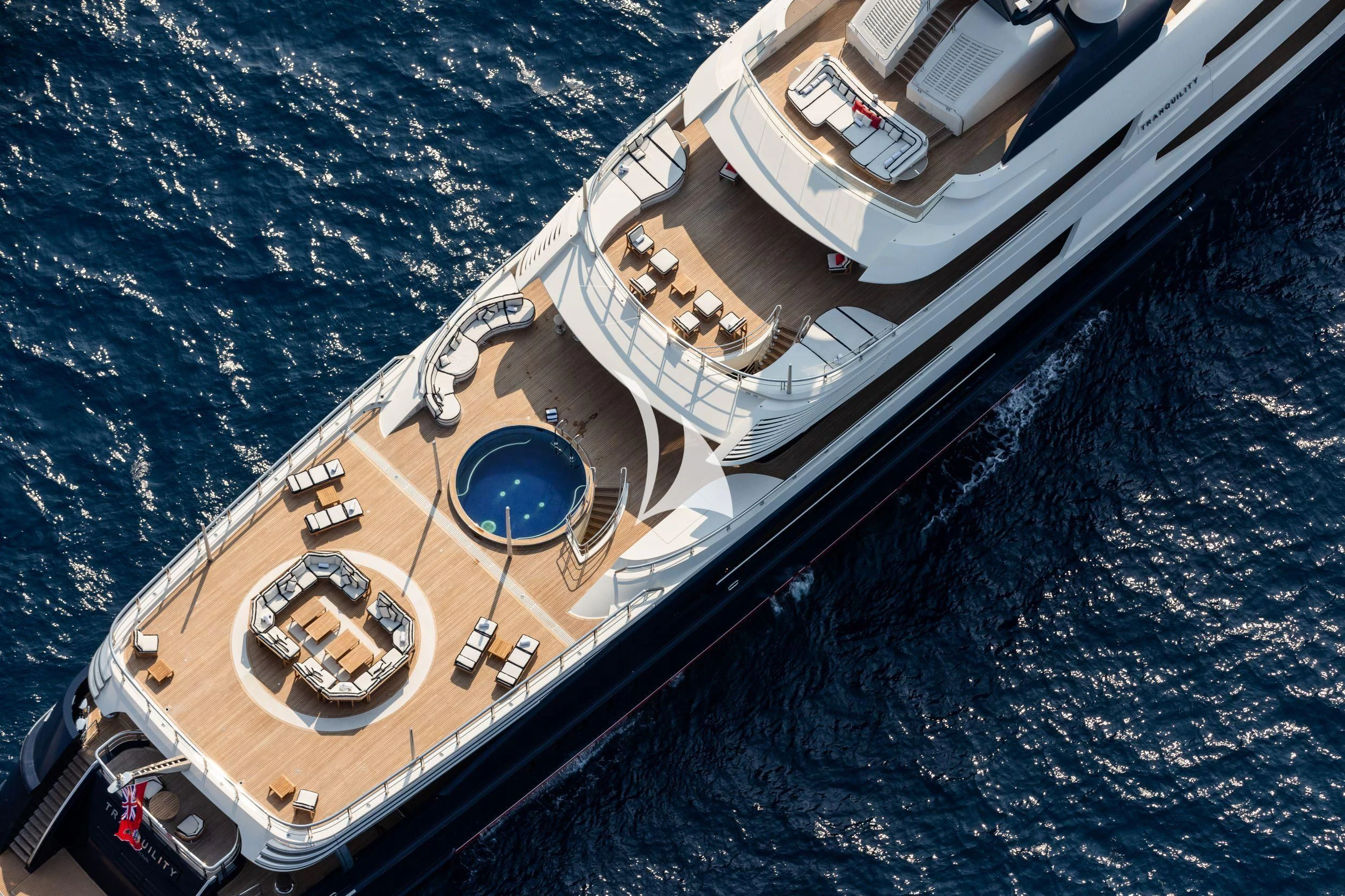 a large ship in the water aboard DRAAK Yacht for Sale