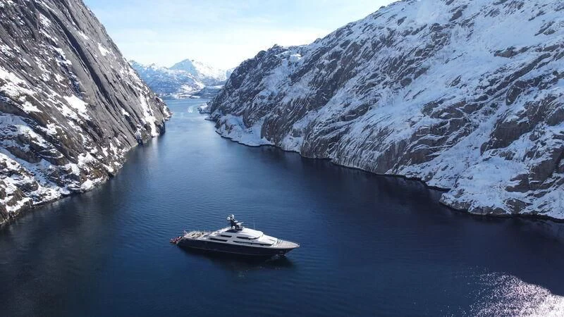 a boat sailing in a lake aboard DRAAK Yacht for Sale