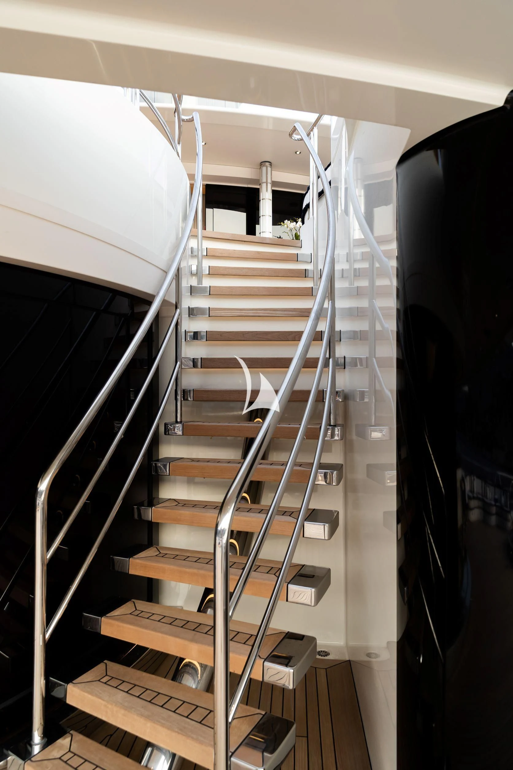 a set of stairs leading up to a room aboard DRAAK Yacht for Sale