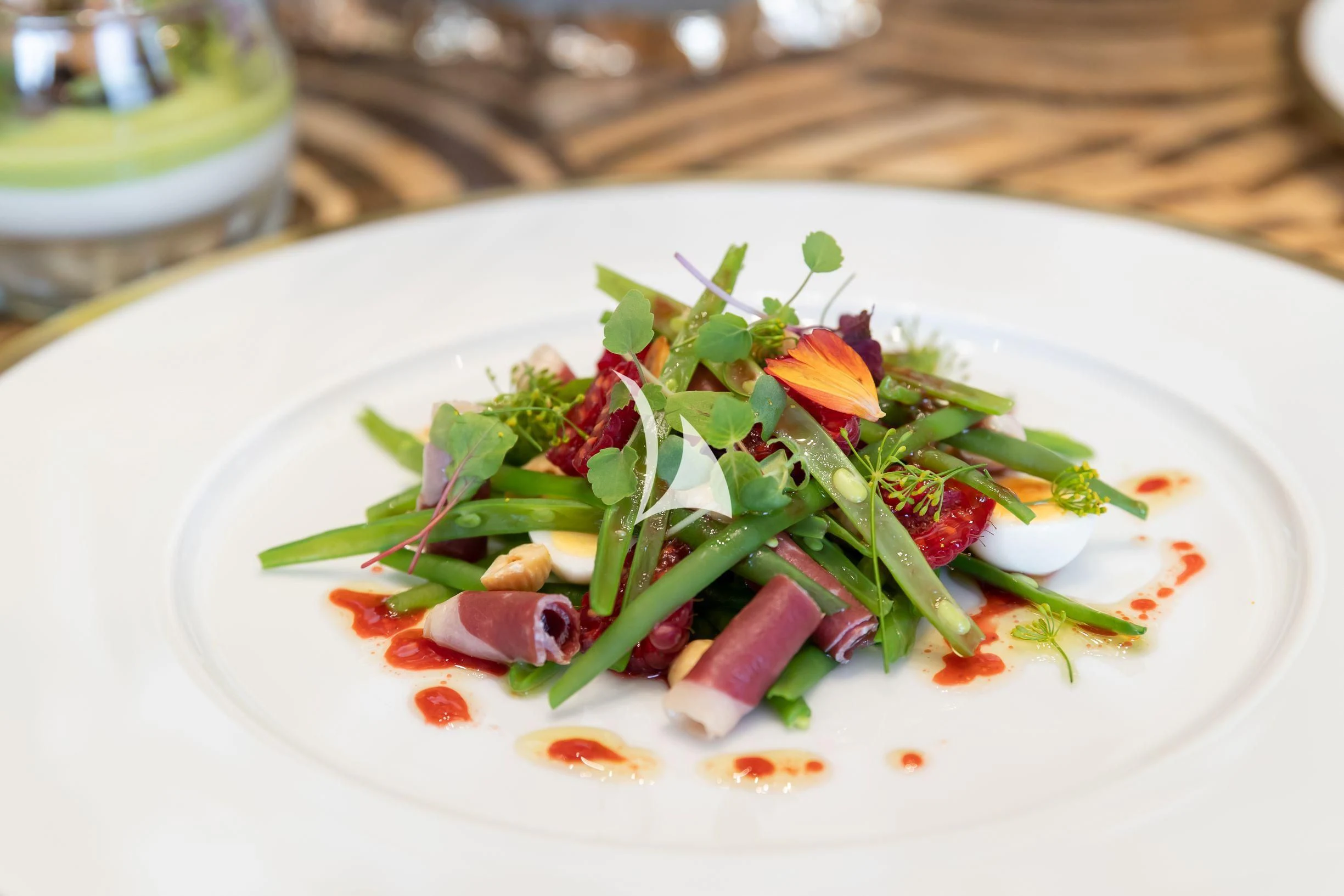 a plate of food aboard DRAAK Yacht for Sale