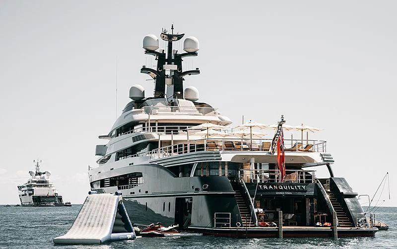 a large ship with a smaller boat on it aboard DRAAK Yacht for Sale