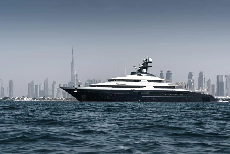 a large boat in the water aboard DRAAK Yacht for Sale