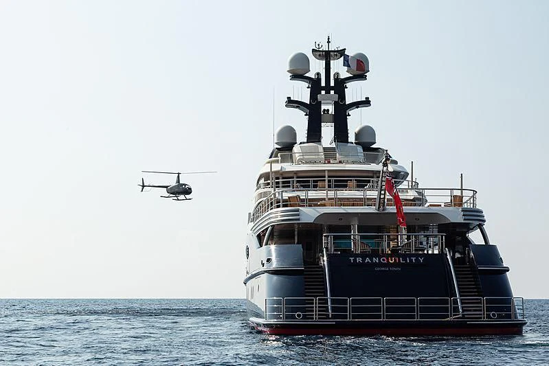 a large ship in the water aboard DRAAK Yacht for Sale