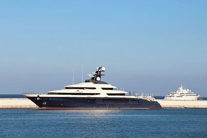 a large ship in the water aboard DRAAK Yacht for Sale