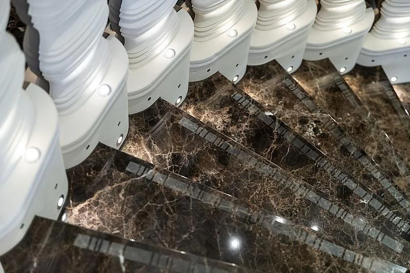 a group of white toilets aboard DRAAK Yacht for Sale