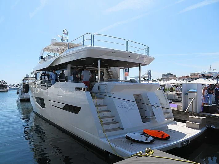 a boat docked at a pier aboard LADY STEFANI Yacht for Sale