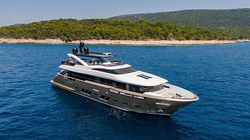 a white yacht on the water aboard MANIKIM Yacht for Sale