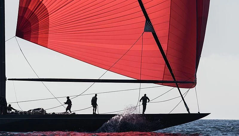 a couple of men on a sailboat aboard SVEA Yacht for Sale