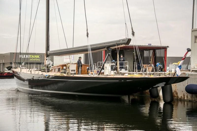 a boat with a sail on the water aboard SVEA Yacht for Sale