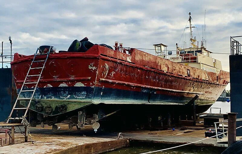 a large ship docked aboard LORRAINE Yacht for Sale