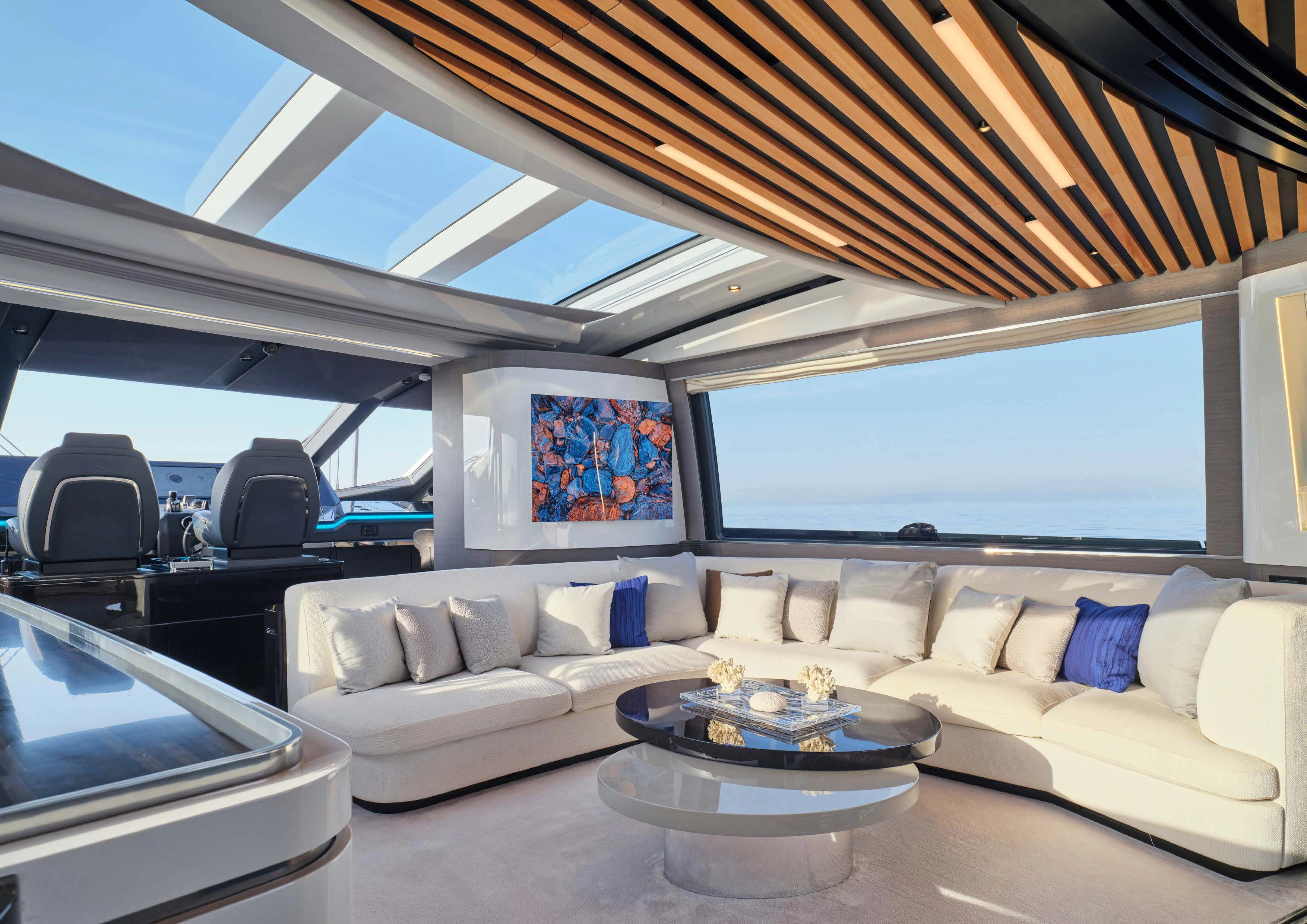 a living room with a large window aboard D FIVE Yacht for Sale