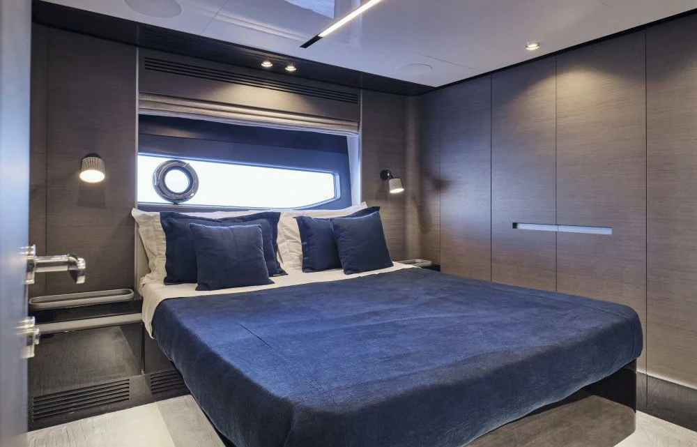a bed in a room aboard D FIVE Yacht for Sale