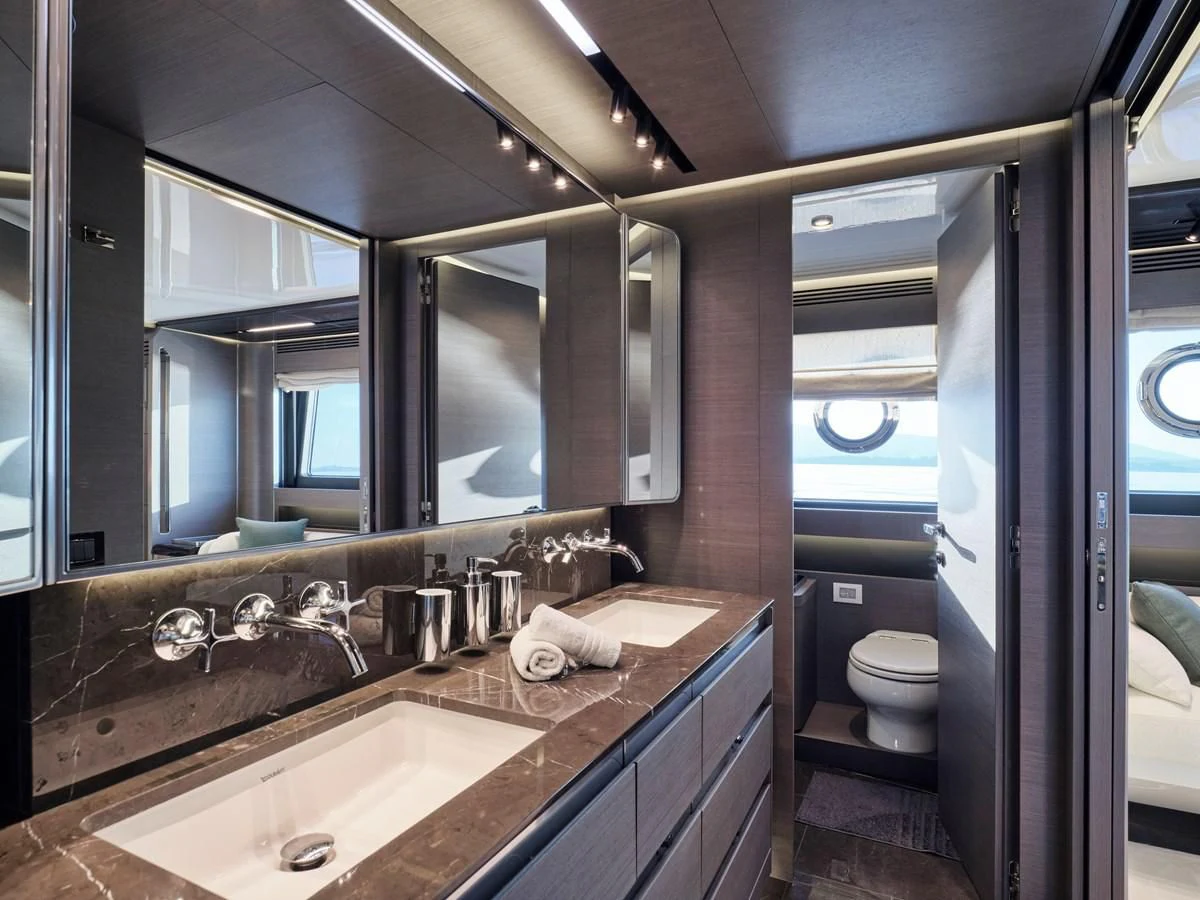 a bathroom with a large mirror aboard D FIVE Yacht for Sale